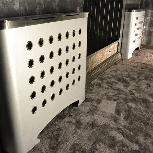 Matrix style CASA Geo galvanised radiator cover in modern loft