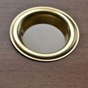 brass eyelet on mahogany wood vinyl radiator cover